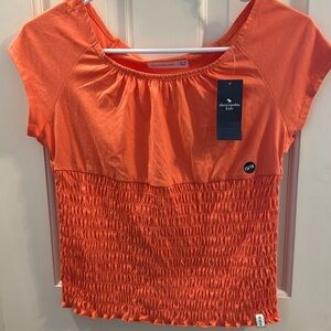 Abercrombie Kids Girls Orange Short-Sleeve Smocked Bottom Tee Size 15/16
